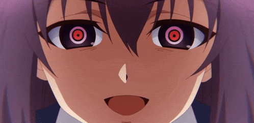 a close up of a girl 's face with a red eye