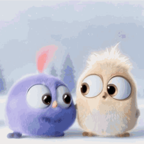 a purple bird and a white bird are looking at each other in the snow