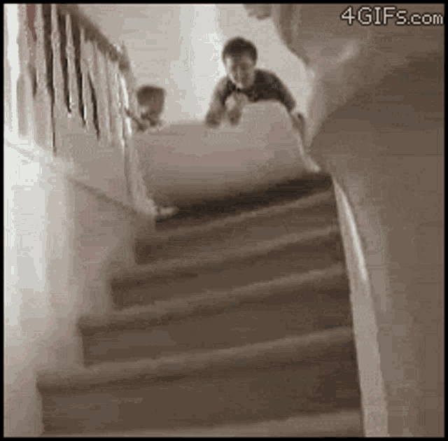 a person is walking down a set of stairs ..