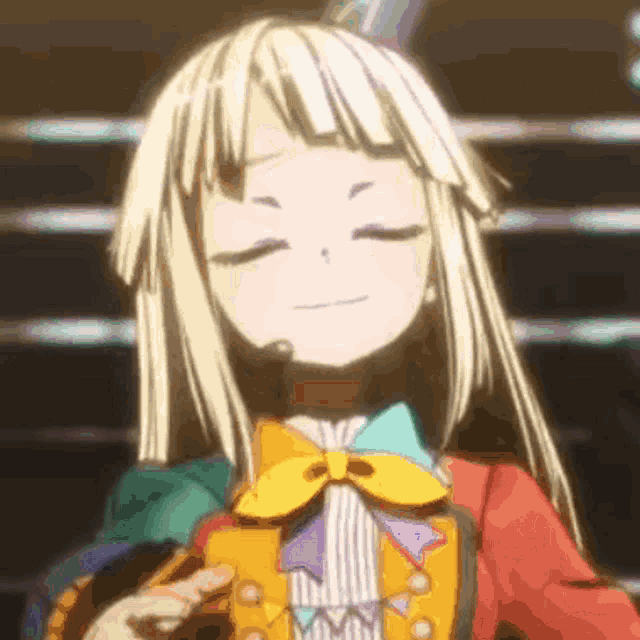 a close up of a blonde anime girl with her eyes closed and a microphone on her head .