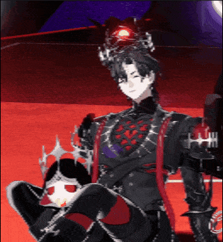 a man with a crown on his head is sitting on a red surface