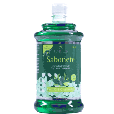 a green bottle of sabonete has a white flower on the label