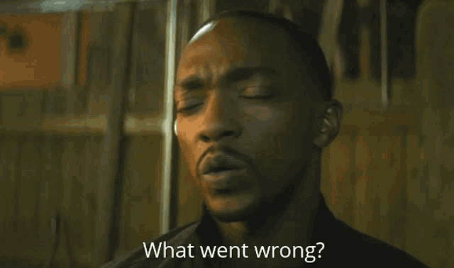 a man is asking what went wrong with a serious look on his face