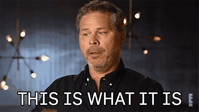 a man says " this is what it is " in front of a dark background
