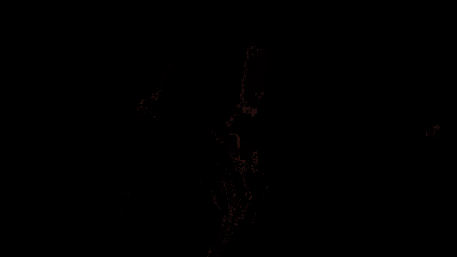 a man in a red cape is holding a sword in a dark room in a video game .