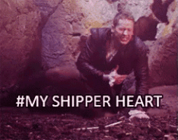 a man is kneeling down with his hands on his chest and the words #my shipper heart above him .