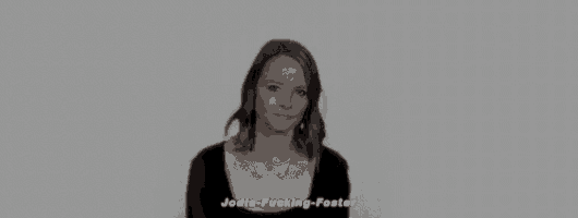 a black and white photo of a woman with her eyes closed and a necklace on her neck .