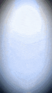 a white circle in the middle of a dark blue sky