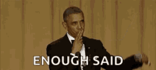 barack obama is wearing a tuxedo and bow tie while giving a speech and says `` enough said '' .
