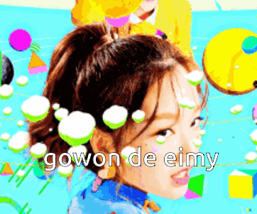 a girl with bubbles in her hair and the words gowon de eimy on her face