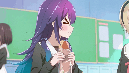 a girl with purple hair is holding a piece of bread in her hands