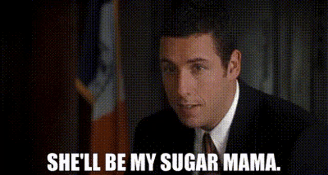a man in a suit and tie is talking to another man and says she 'll be my sugar mama .