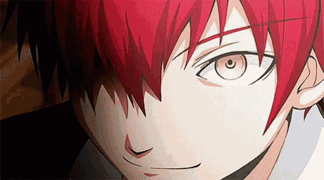 a close up of a boy with red hair and white eyes .