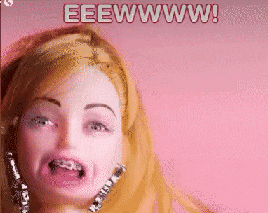 a close up of a doll with braces on her teeth and the words eeewww on the bottom