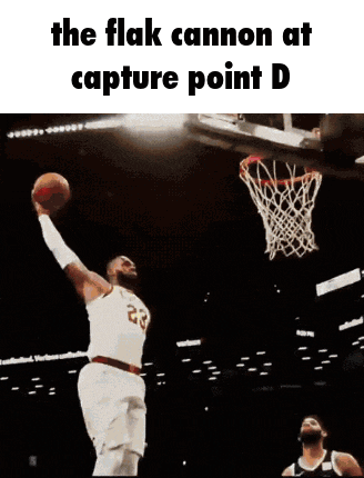 a basketball player is jumping in the air to catch a basketball .