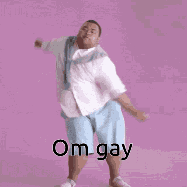 a man in a white shirt and blue shorts is dancing in front of a pink background with the words om gay above him