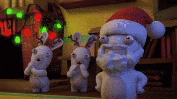 a group of stuffed animals wearing santa hats
