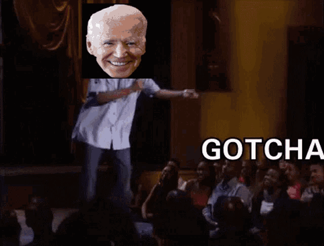 a picture of joe biden with the words gotcha bitch behind him