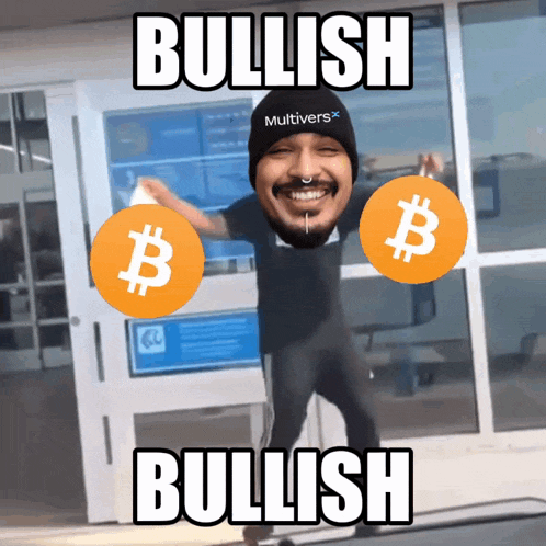 a man wearing a multiverse hat is holding two bitcoins in his hands