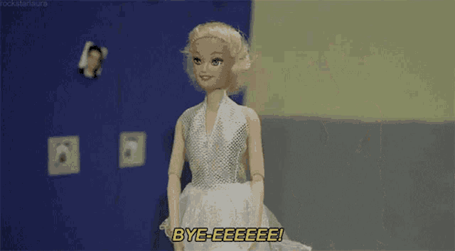 a barbie doll in a white dress says bye-eeeee