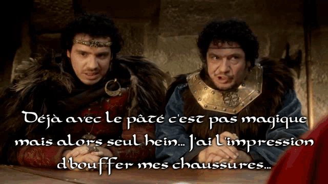 two men are sitting at a table with the words deja avec le pate c'est pas magique on the bottom