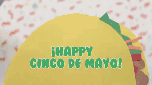 a happy cinco de mayo sign with a taco in the background