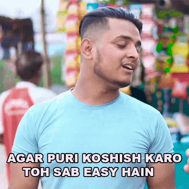 a man wearing a blue shirt says agar puri koshsh karo toh sab easy hain