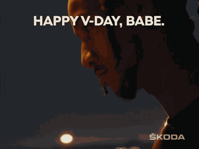 a skoda ad shows a couple kissing and the words happy v-day babe