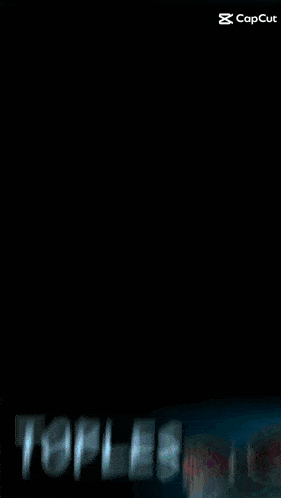 a blurred image of a person with the word capcut on the bottom left