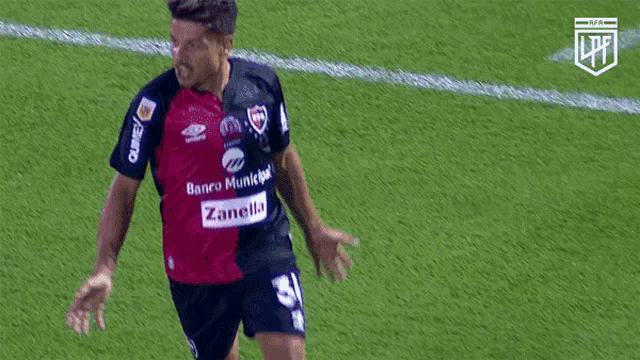 a soccer player with the number 31 on his shorts is running on the field