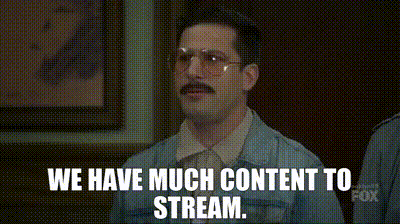 a man with glasses and a mustache is saying `` we have much content to stream . ''