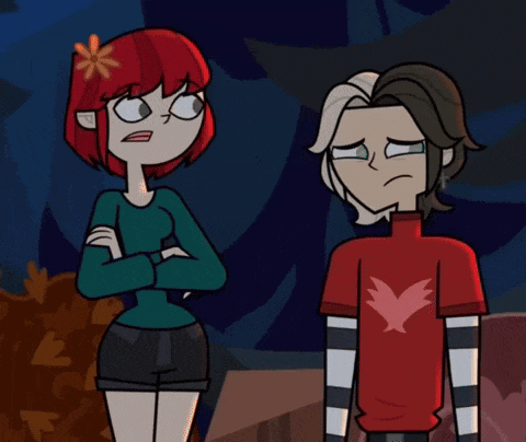 a boy and a girl are standing next to each other and the girl is wearing a red shirt with a bird on it