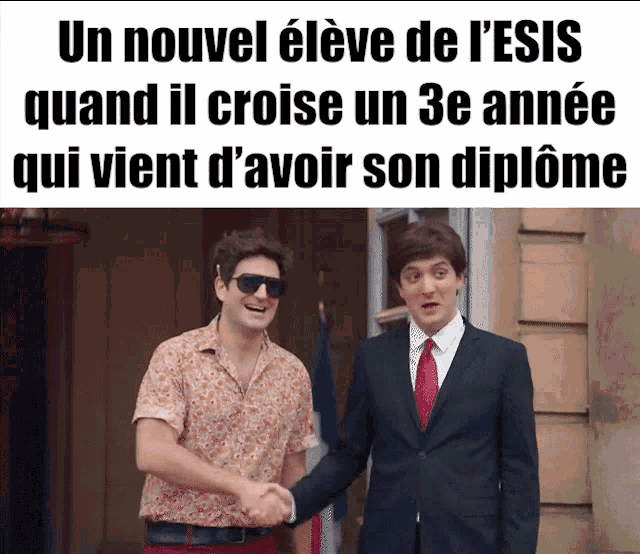 two men shake hands in front of a sign that says un nouvel eleve de l' esis