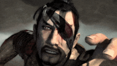 a man with a bandage on his eye looks at the camera