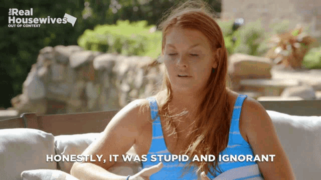 a woman sitting on a couch with the words " honestly it was stupid and ignorant " written below her