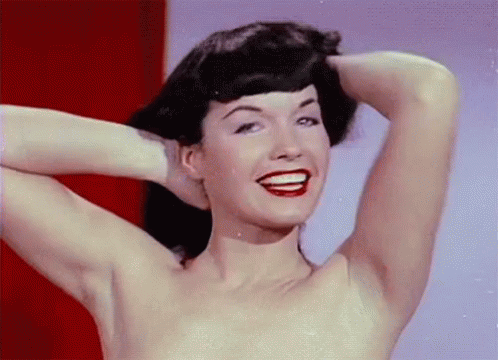 Betty Page Wave GIF - Betty Page Wave Smile GIFs