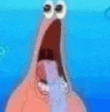a close up of patrick star from spongebob squarepants with his mouth open .