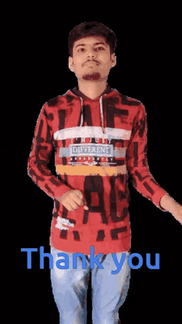 a man wearing a red shirt that says " different " on it