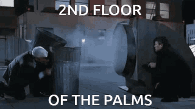 two men are kneeling in front of a trash can with the words 2nd floor of the palms below them