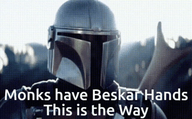 monks have beskar hands this is the way written on a picture of a person in a helmet .