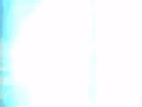 a blue light is shining on a person in a dark room