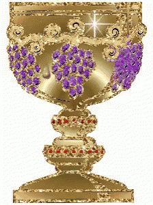 a gold chalice with purple grapes and a star on it