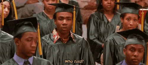 a group of graduates are sitting in a row and one of them is asking who told ?