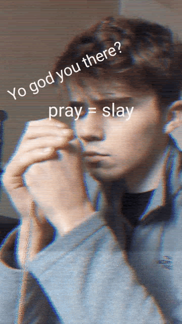 a young man prays with the words yo god you there pray = slay written above him