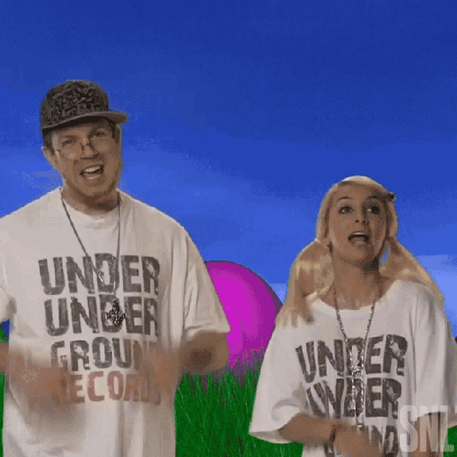 a man and a woman are standing next to each other wearing shirts that say under ground records