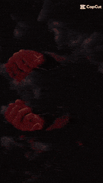 a red glowing object with a capcut logo on the bottom