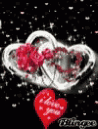 a couple of hearts with roses on them and a red heart that says `` i love you '' on it .