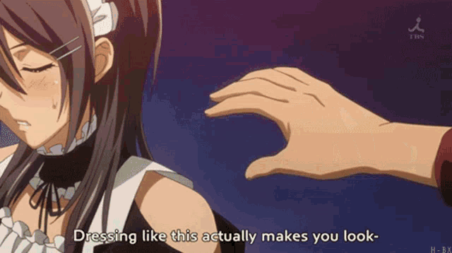 a hand is touching a girl 's face with the words dressing like this actually makes you look