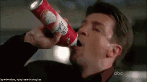 a man is drinking a can of diet coke .