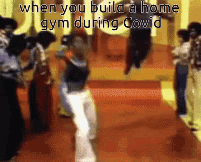 a group of people are dancing in a room with the words when you build a home gym during covid